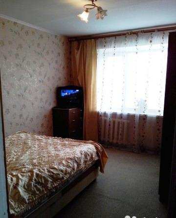 Купить 4 комнатную квартиру 64 кв м по ул Крымская в Феодосии.